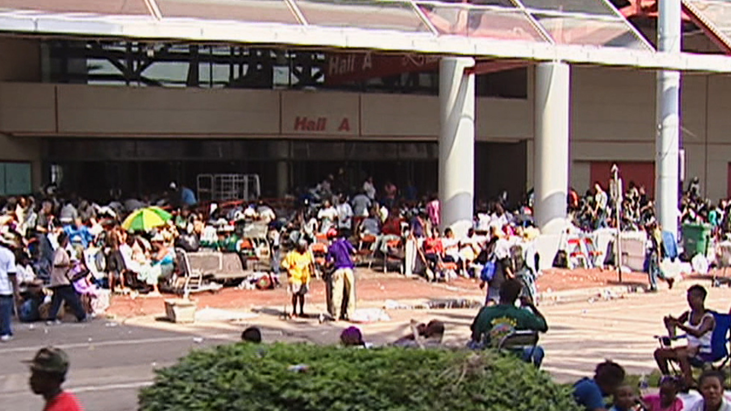 Stranded New Orleans residents gather outside of the Convention Center following Hurricane... [Photo of the day - July 2025]