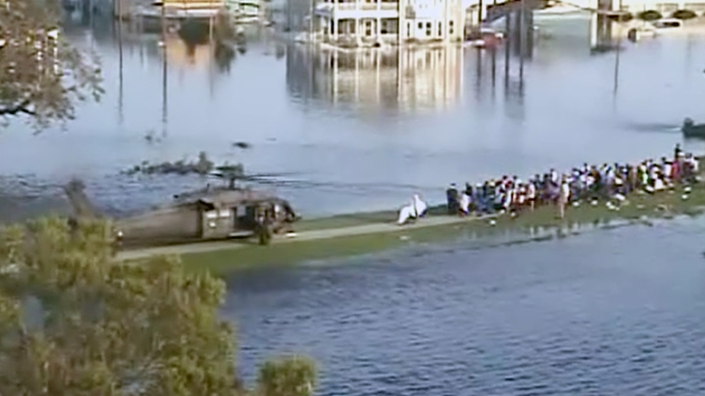 A military helicopter arrives to rescue stranded New Orleans residents in the aftermath of... [Photo of the day - July 2025]