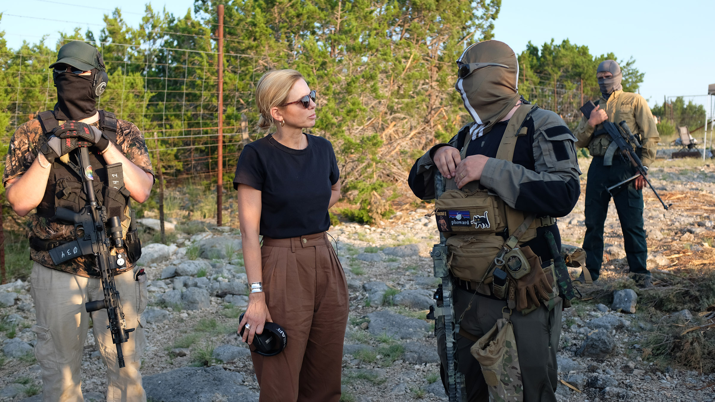 Mariana van Zeller stands with El Gato, co-founder of the Black Cat Rifle Group. Image from... [Photo of the day - August 2025]