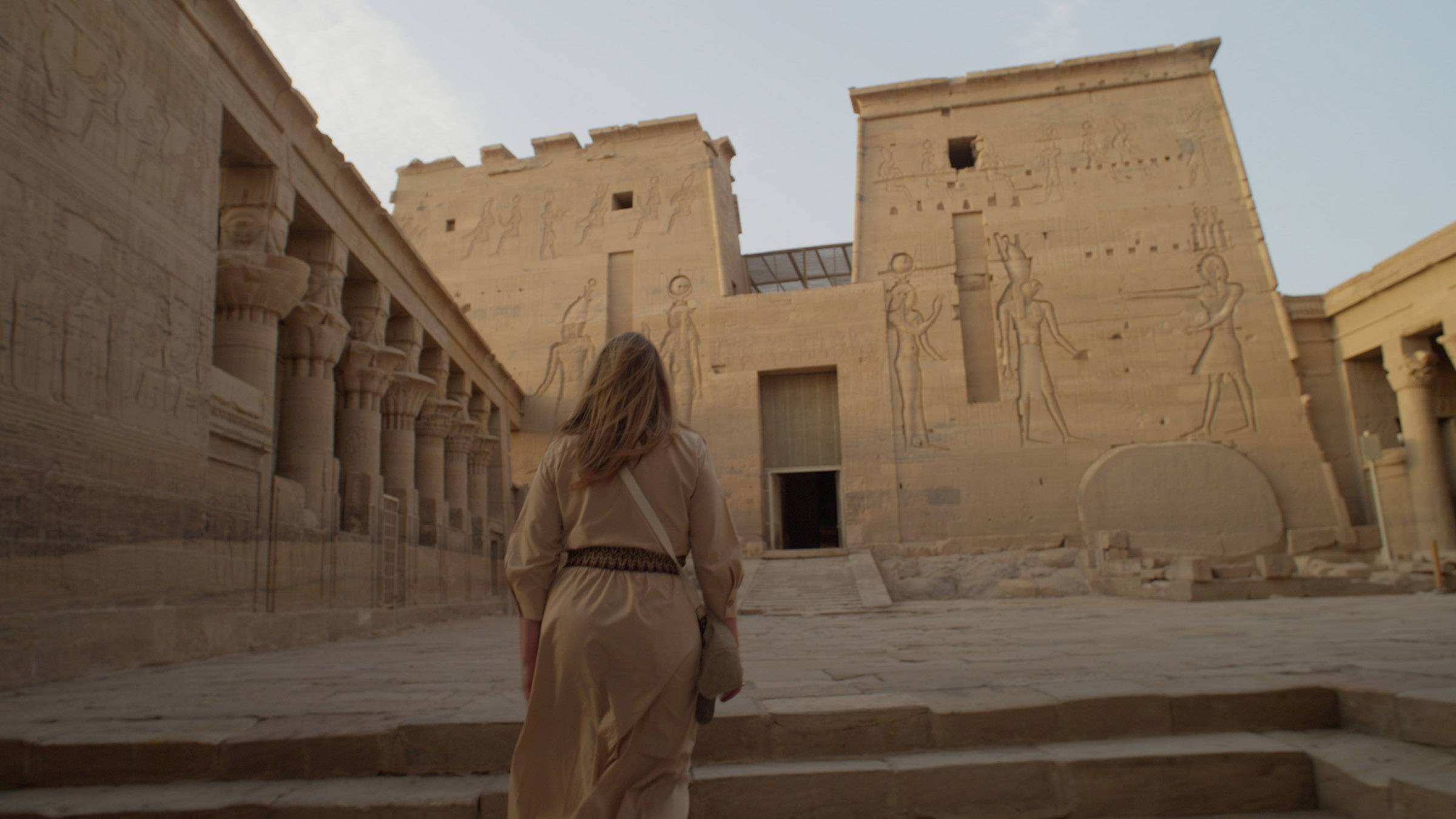 Kathleen Martinez walks towards the tomb entrance. Image from Cleopatra's Final Secret. [Photo of the day - September 2025]