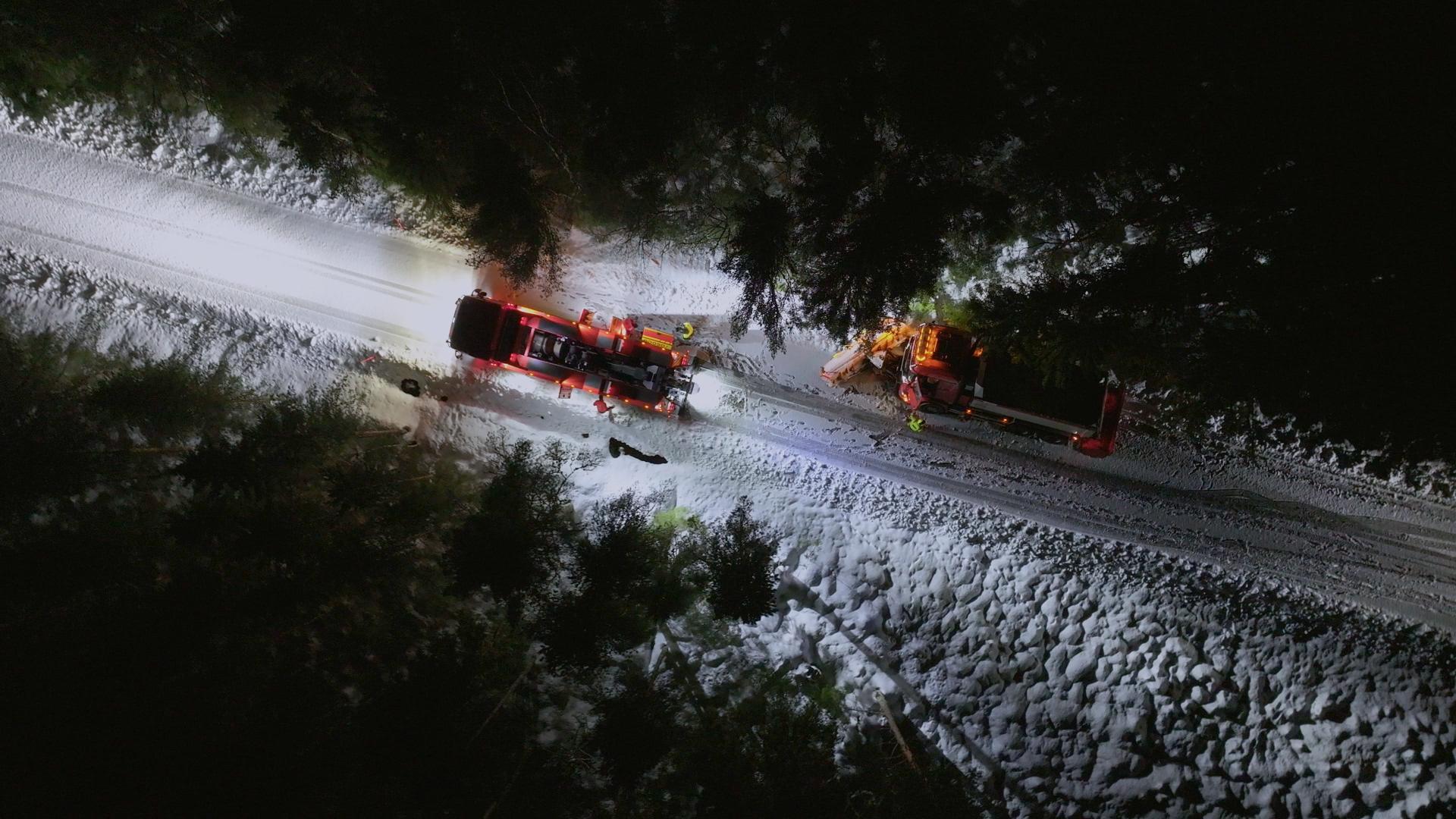 A snow plough drove off the road on a narrow forest road. Torstein and Raido use the big tow... [Photo of the day - November 2025]