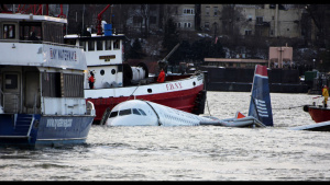 Rescue boats float next to a US... [Photo of the day -  3 DECEMBER 2025]