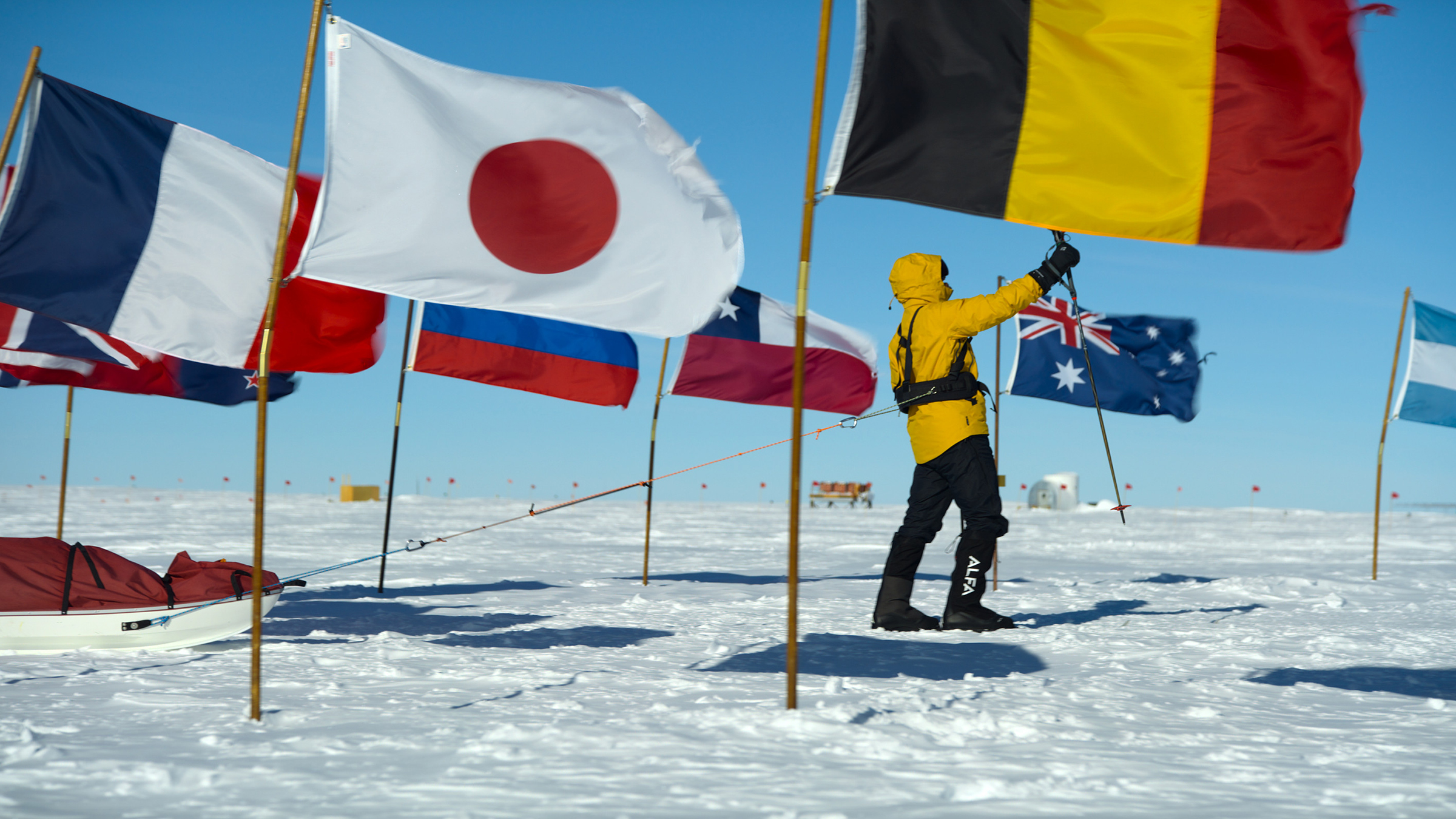 Will Smith skis past flags surrounding the South Pole on his grueling trek to the southern most... [Photo of the day - January 2026]