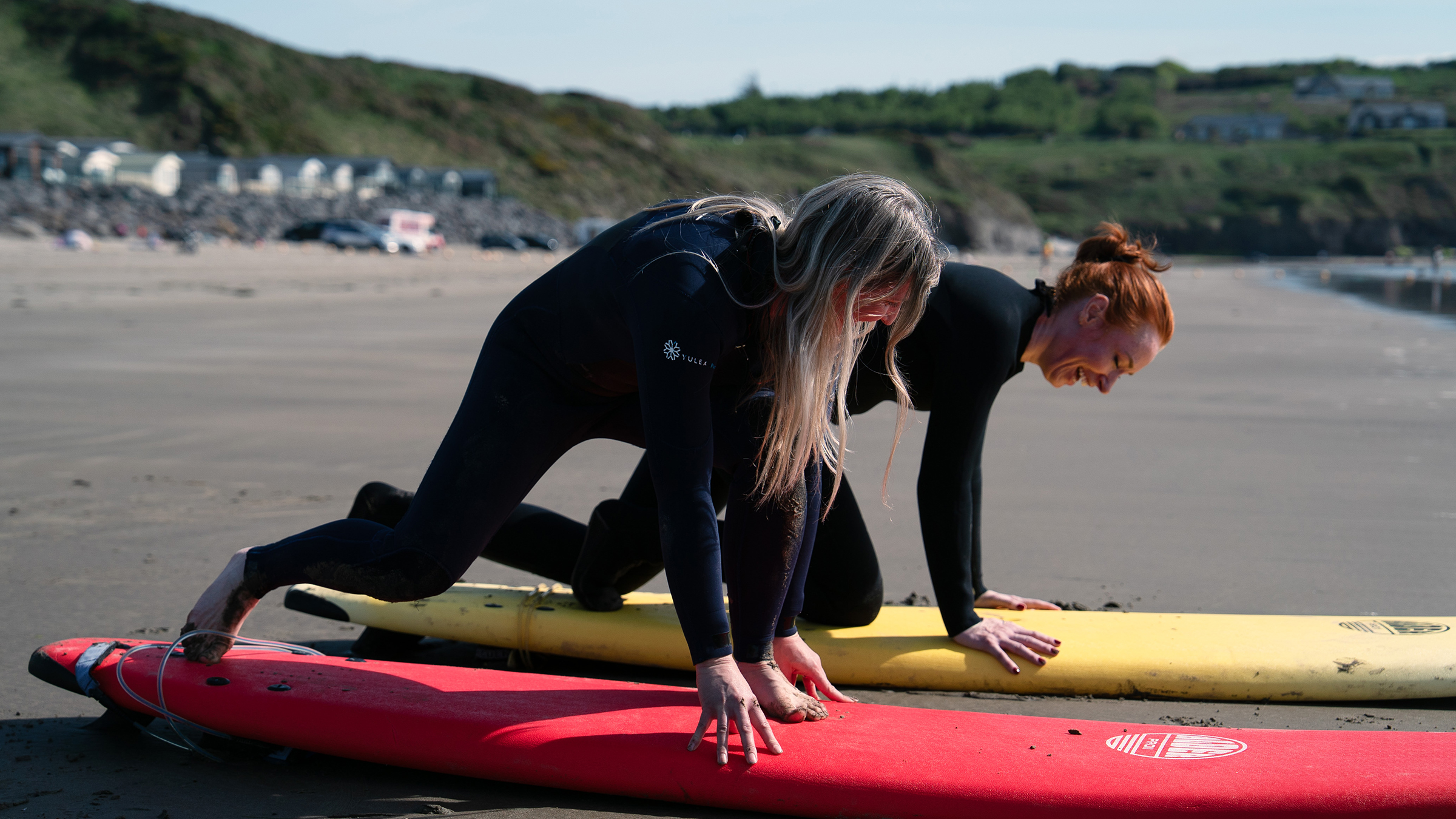 Hannah Fry learns to surf from professional surfer Easkey Britton. [Photo of the day - March 2026]
