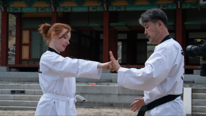 Taekwondo instructor teaching Hannah... [Photo of the day - 14 MARCH 2026]