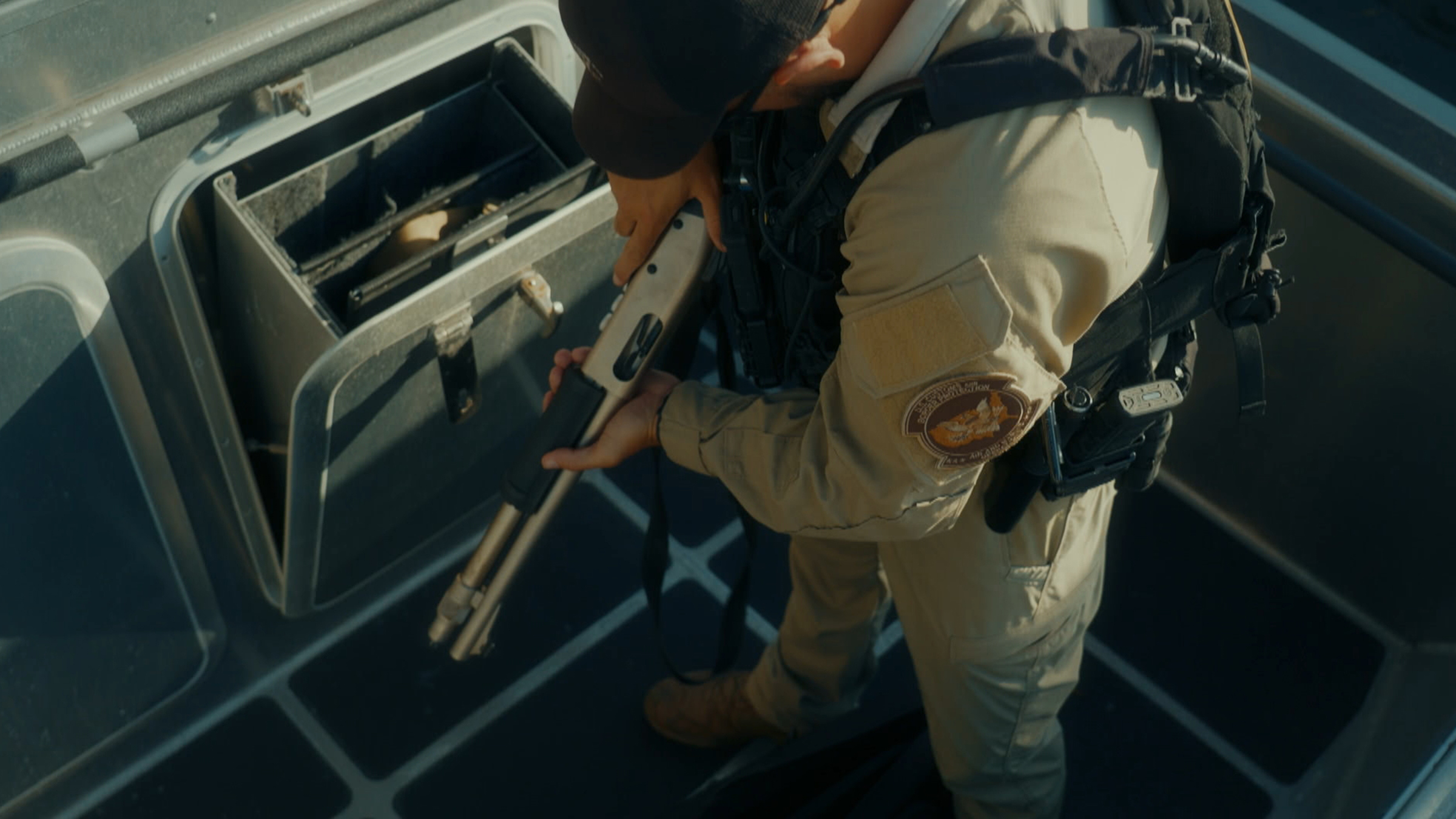 Customs and Border Patrol officer on the patrol boat. [Photo of the day - April 2026]