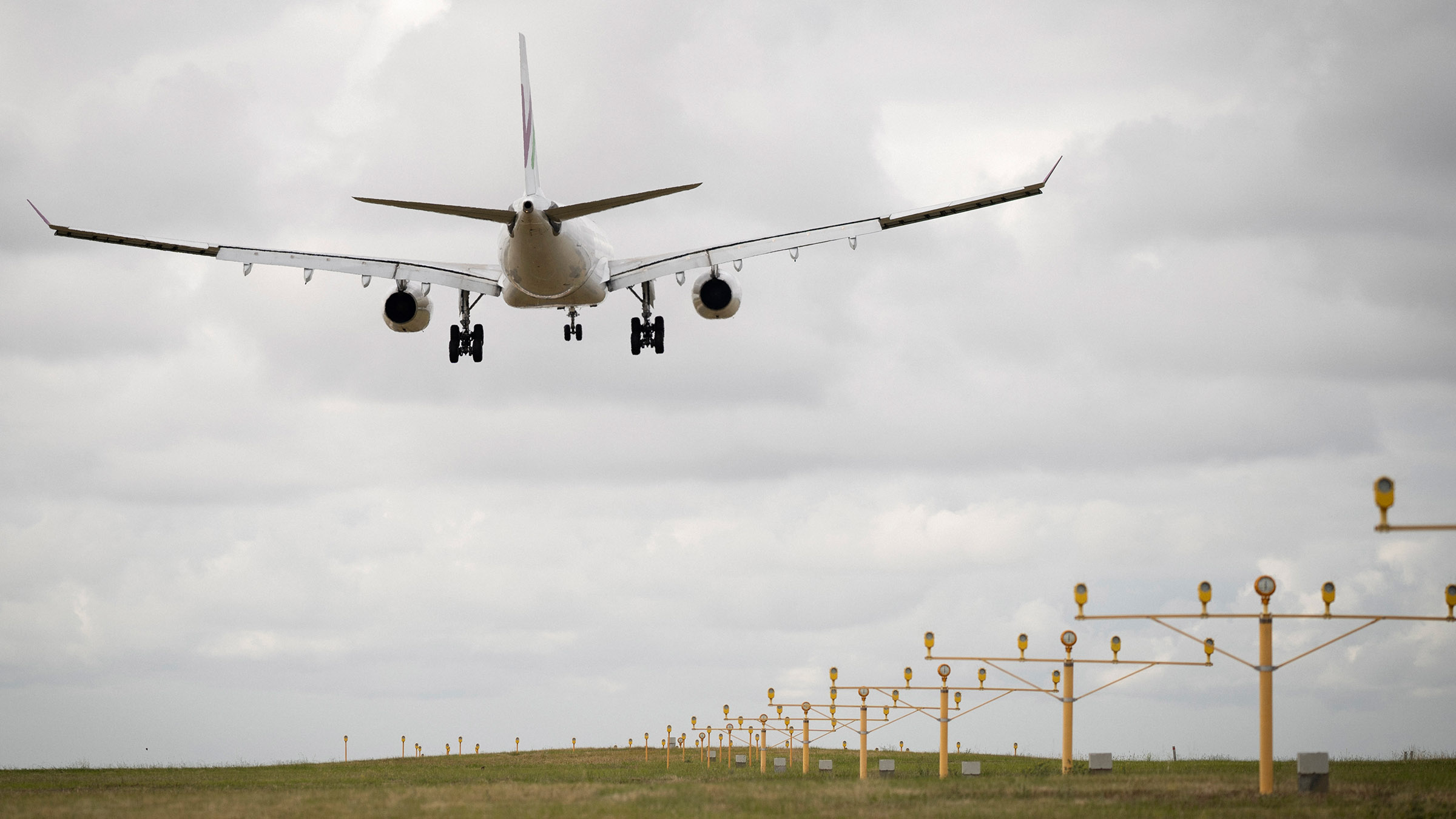 A plane lands at Melbourne Airport. Melbourne Airport is Australia's busiest airport, with over... [Photo of the day - April 2026]