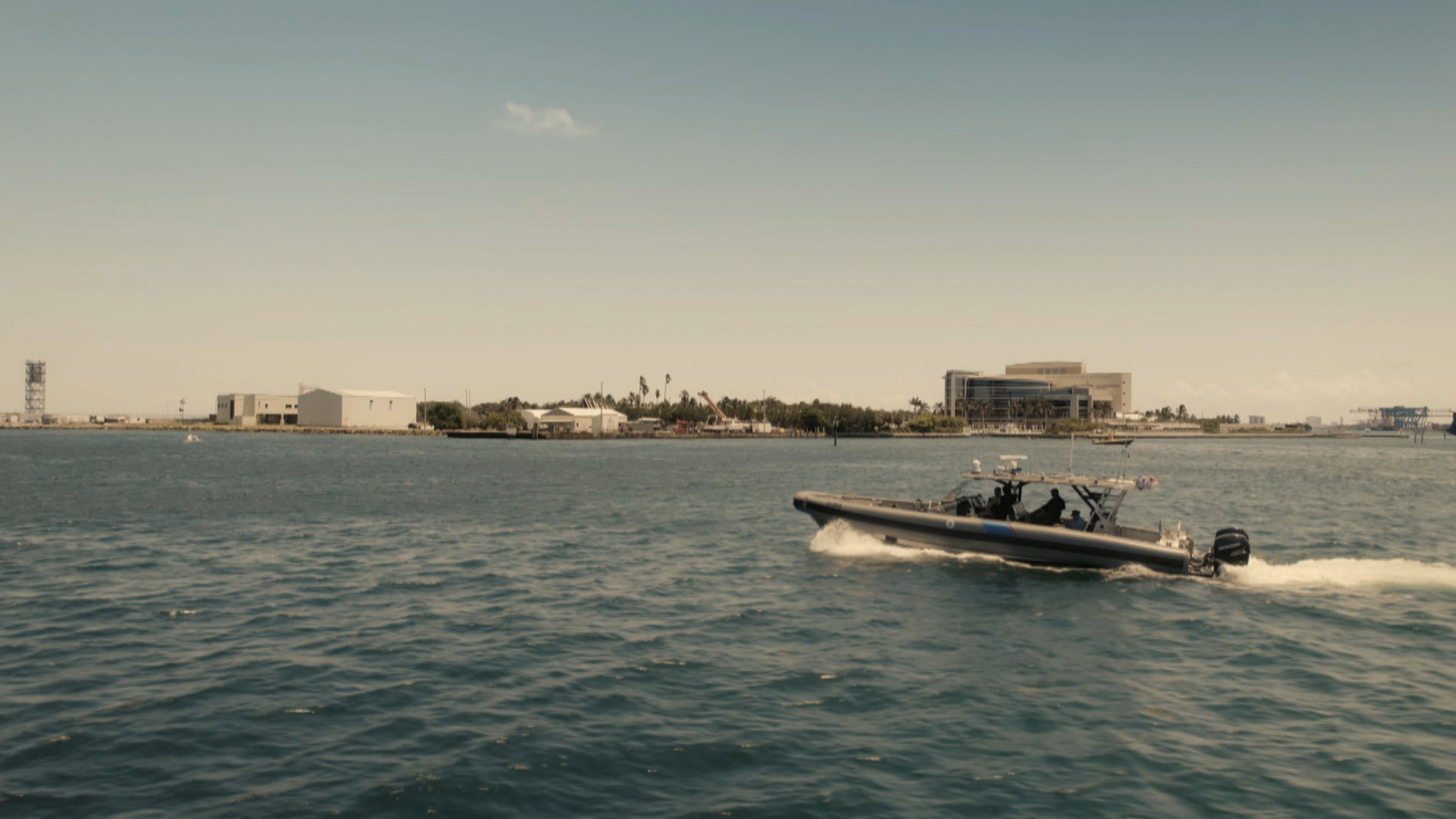 The marine operations patrol boat travels past. Image from To Catch a Smuggler: Contraband Capture. [Photo of the day - September 2026]