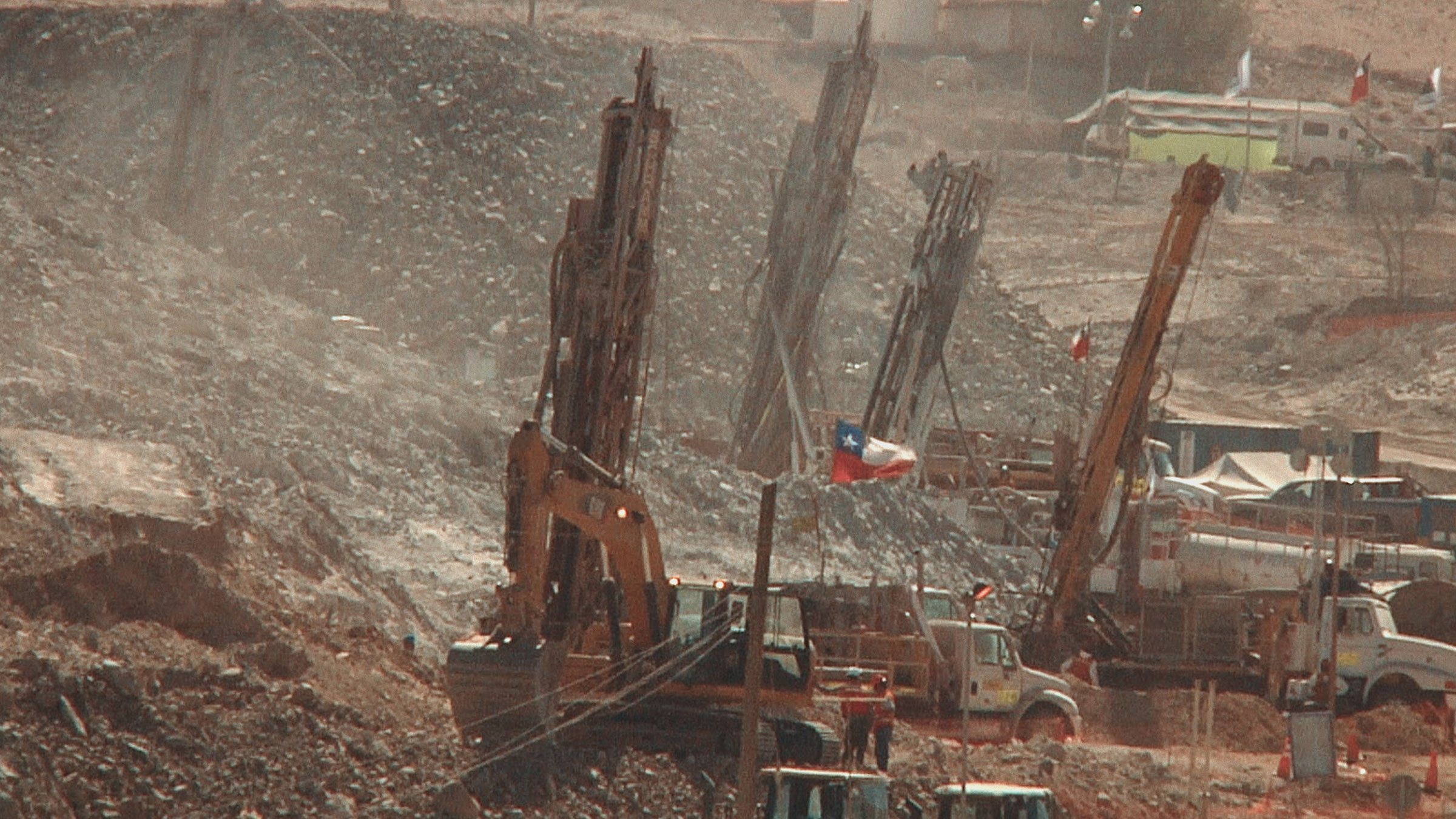 The drilling site with excavators and drillers. Image from Chilean Mine Rescue. [Photo of the day - October 2026]